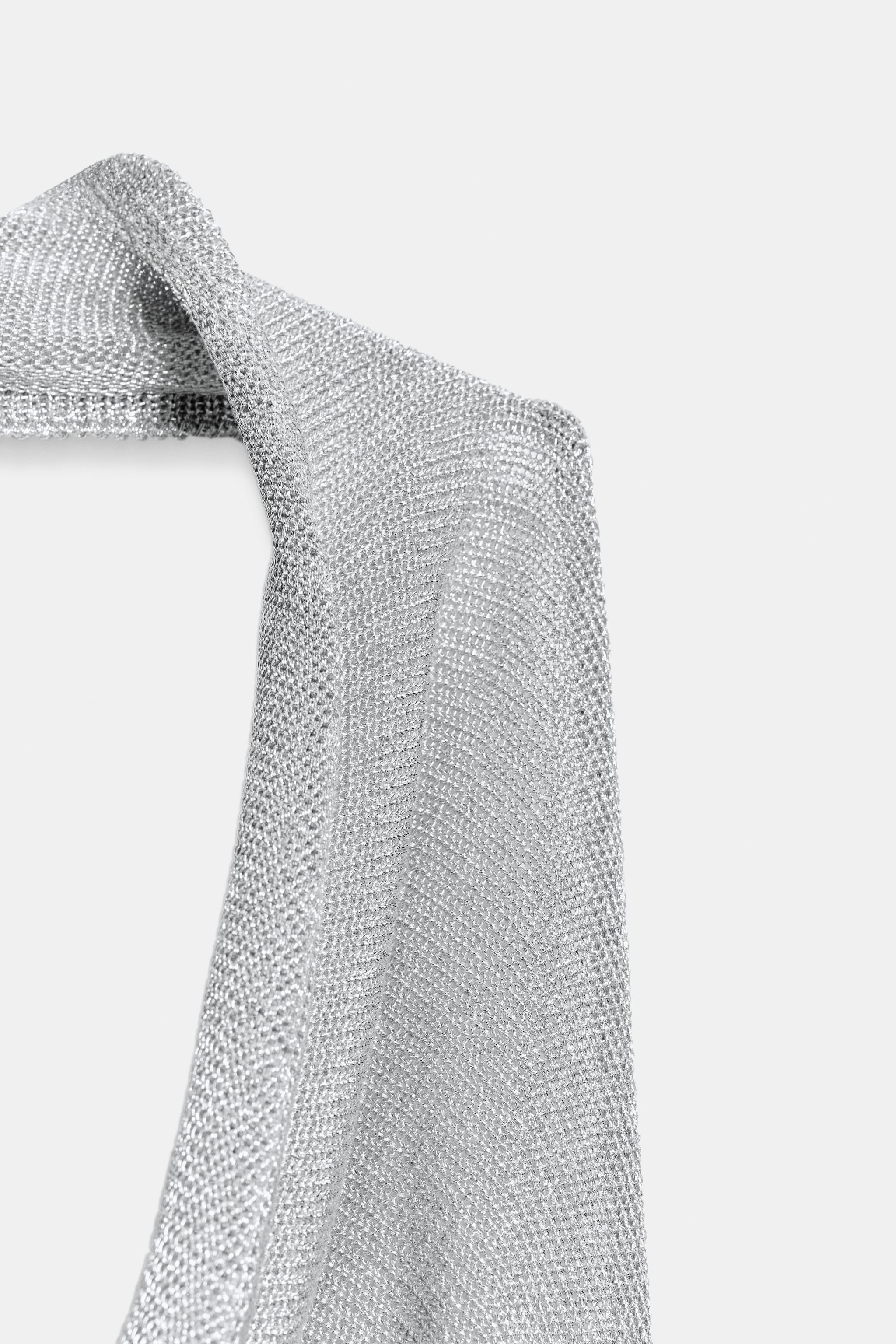 TOP EN MAILLE HALTER À FIL MÉTALLISÉ